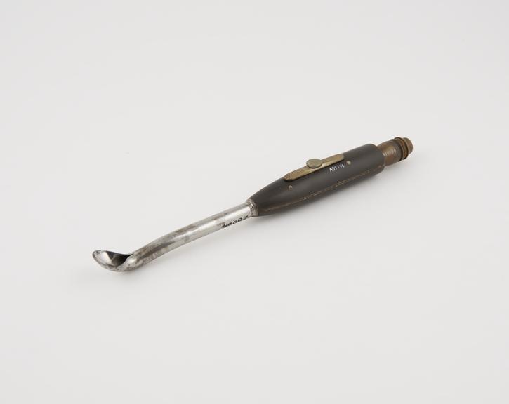 Curette for flushing, steel and vulcanite, late 19th century