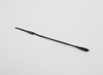 Combined spatula and olive-ended probe