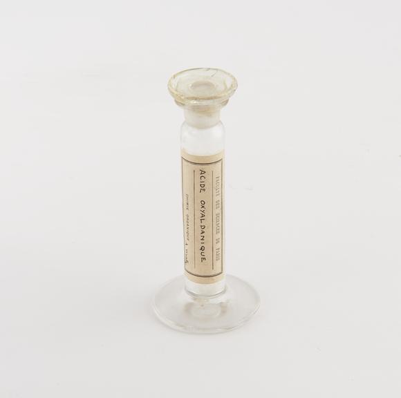 Glass stoppered vial containing Acide Oxyaldanique