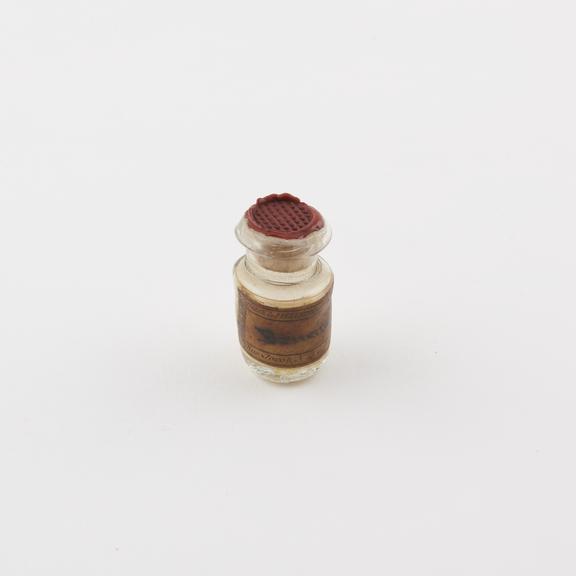 Glass vial with cork stopper sealed with wax