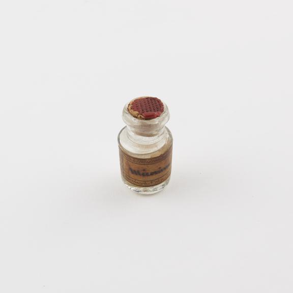 Glass vial with cork stopper sealed with wax