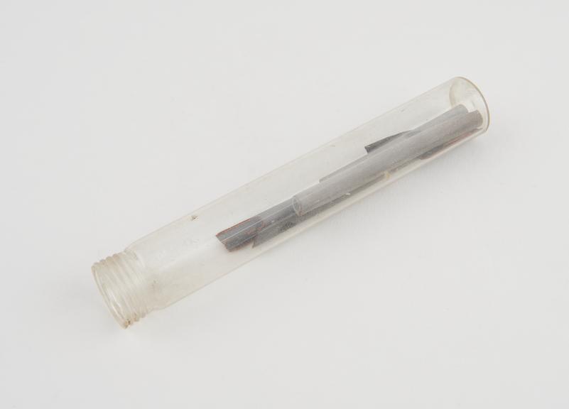 Broken drainage tube in glass cylinder