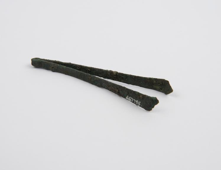 Depilatory forceps, bronze, encrusted, Roman, 199BC-500AD