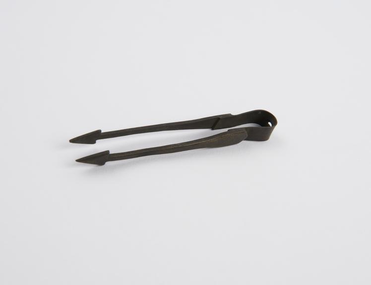 Forceps with arrowhead ends, brass