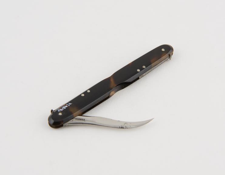 Syme and Paget abscess knives in tortoiseshell sheath, folding