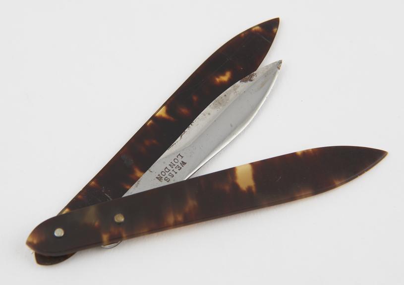 Seton needle, steel, in tortoiseshell sheath