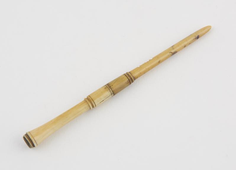 Trocar and cannula in ivory container, 19th century