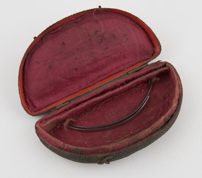 2 suture needles, steel, in fishskin case, 19th century