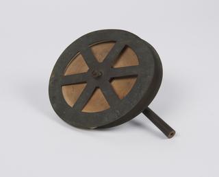 Metal reel with paper