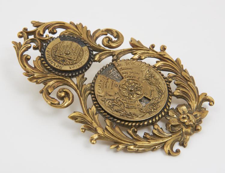 Perpetual Calendar, brass scroll-work chased