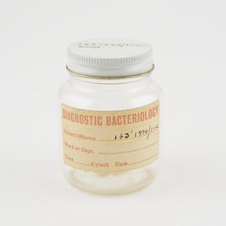 Bottle for mitral and aortic replacement heart valves, 1960s.