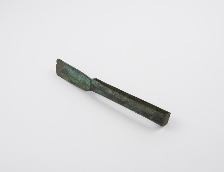 Bronze strigil, end of blade missing, flat looped handle, Roman