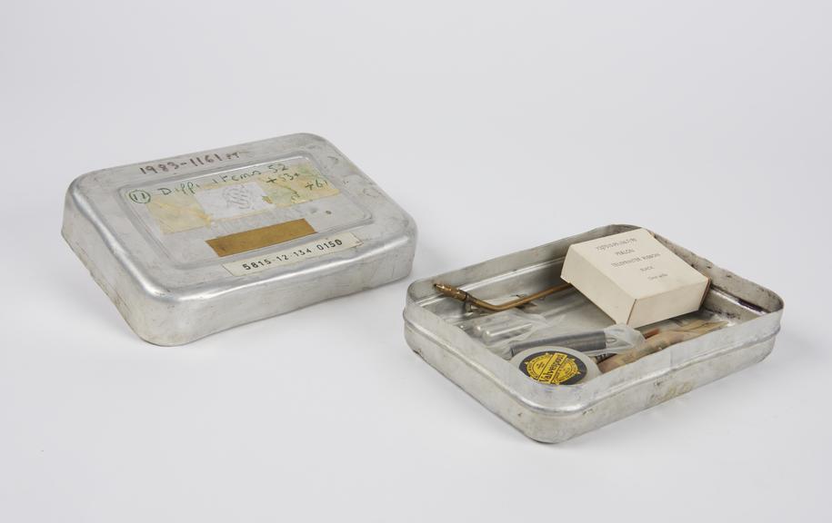 Tin case containing; one Teleprinting ribbon by Perlon