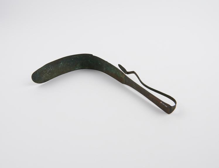 Strigil, animal decoration on handle, bronze, Roman