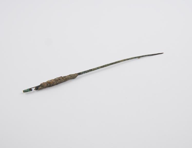 Curved needle, bronze, encrusted, Roman, 199BC-500AD