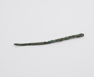 Curved bronze needle, Roman(?), 199BC-500AD