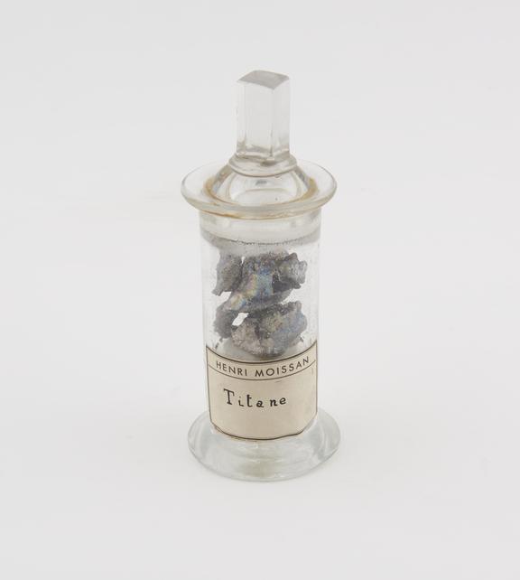 Titane in a specimen jar with glass stopper