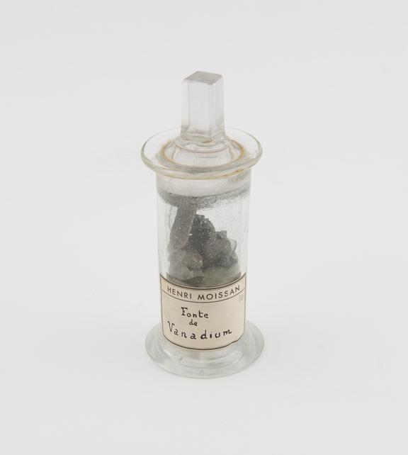 Font de vanadium in a specimen jar with glass stopper