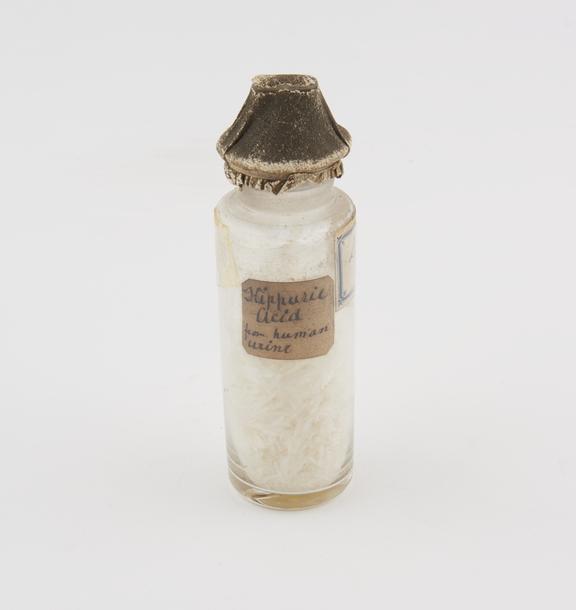 Glass stoppered jar containing compound (Hippuric Acid)