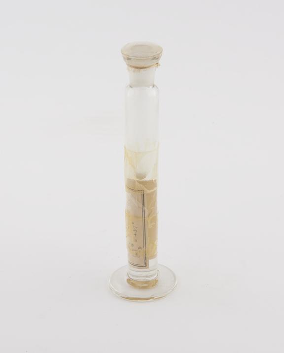 Glass specimen jar containing compound (Phrenosinic Acid