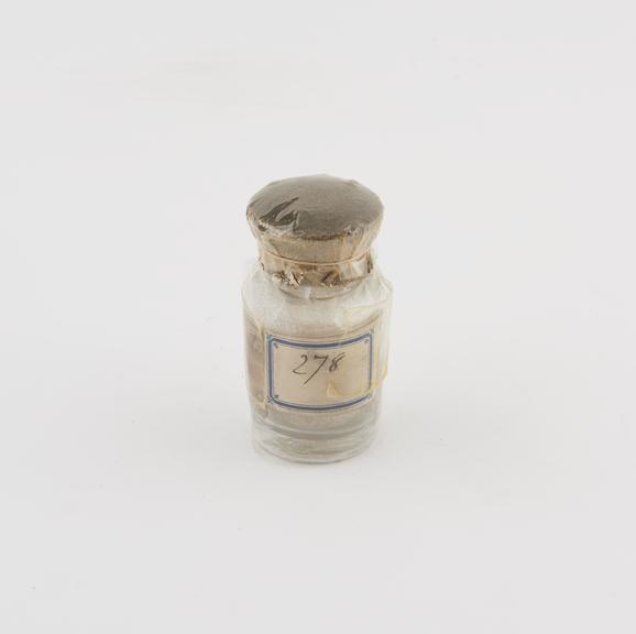 Glass stoppered jar containing compound (Baryta), 1870-1880