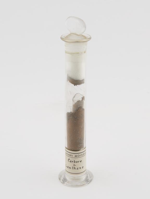 Carbure de lanthane in a tall specimen jar with glass stopper