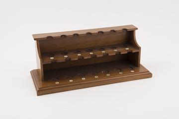 Wooden stand for fourteen specimens of rare earths