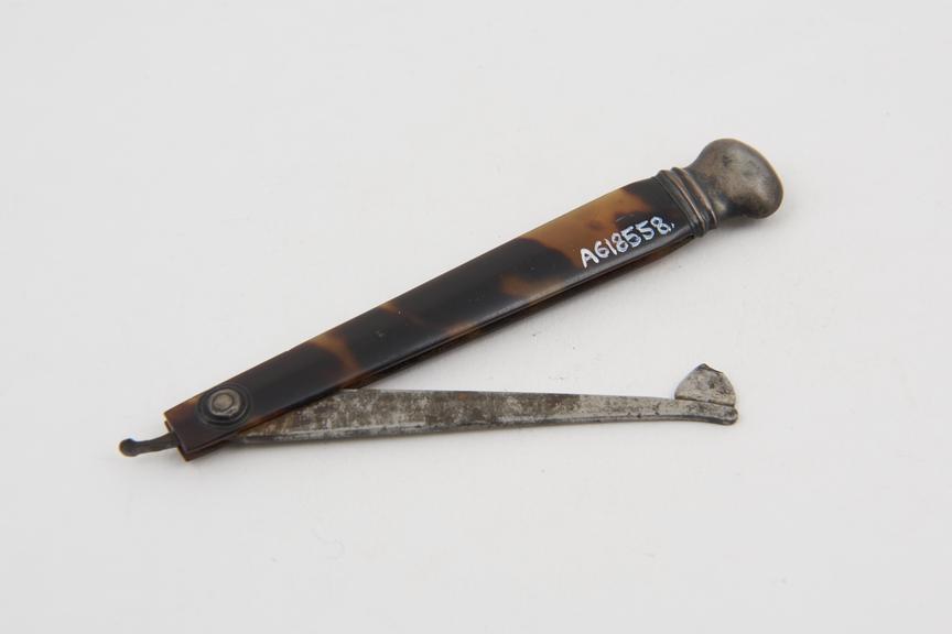 Gum lancet, steel, folding, angled head, in tortoiseshell case