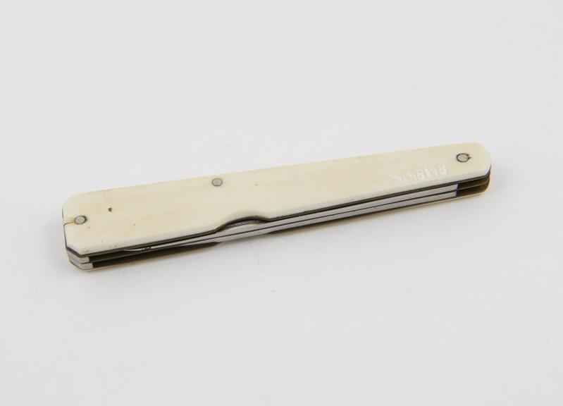 Syme's abscess knife, with gum lancet, stel, folding