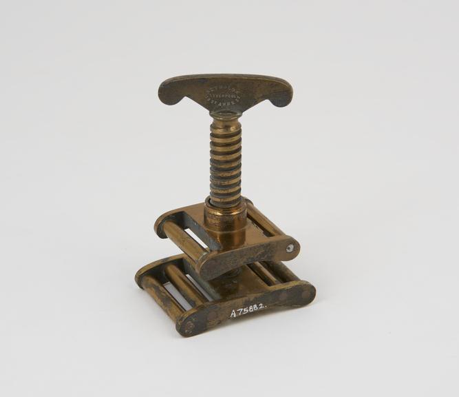 Tourniquet, Petit's type, brass screw device only, by Reynolds