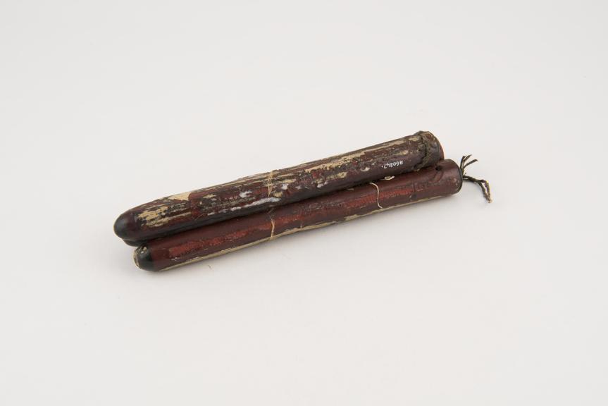 Three rectal dilators, gum elastic, stuck together, 19th century