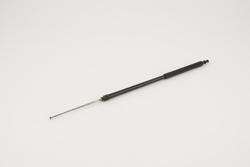 Wire adjuster, steel and ebonite, by Arnold and Sons of London