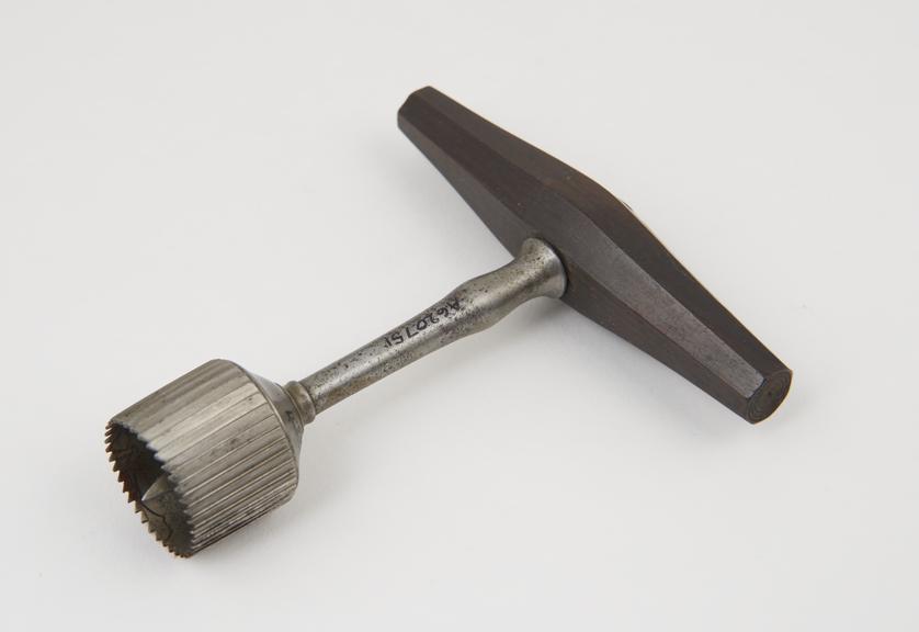 Cranial trephine with wooden handle