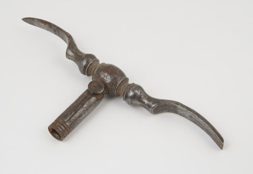 Handle of cranial trephine, shaped to be used as skull elevator