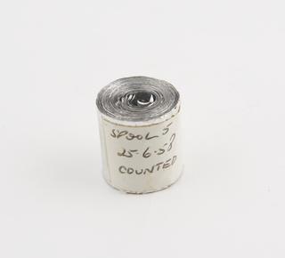 Spool 5 of aluminium rainfall record tape, counted, unsigned, United Kingdom, dated 25 June 1958