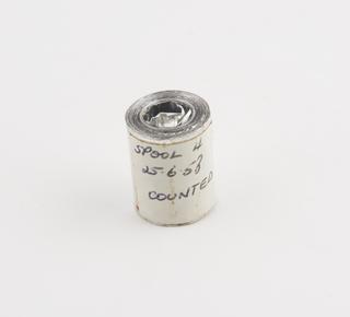 Spool 4 of aluminium rainfall record tape, counted, unsigned, United Kingdom, dated 25 June 1958