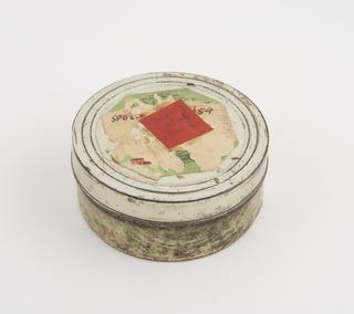Film cannister containing reel of aluminium rainfall record tape, spool 5, unsigned, United Kingdom, taken on ascent 3 on 12 January 1965