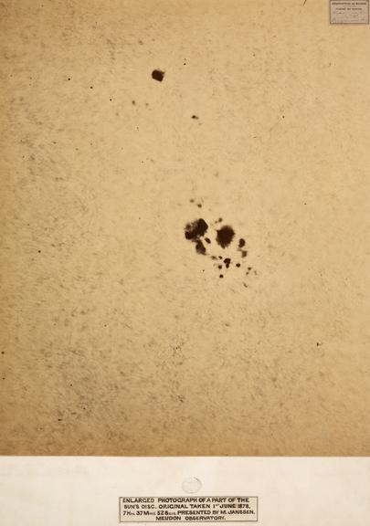 One of four photographs in window mounts showing an enlarged portions of the Sun's visible disc