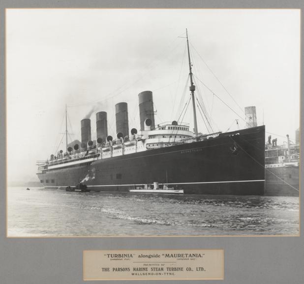 Framed and glazed photo of "Turbinia" alongside "Mauretania"