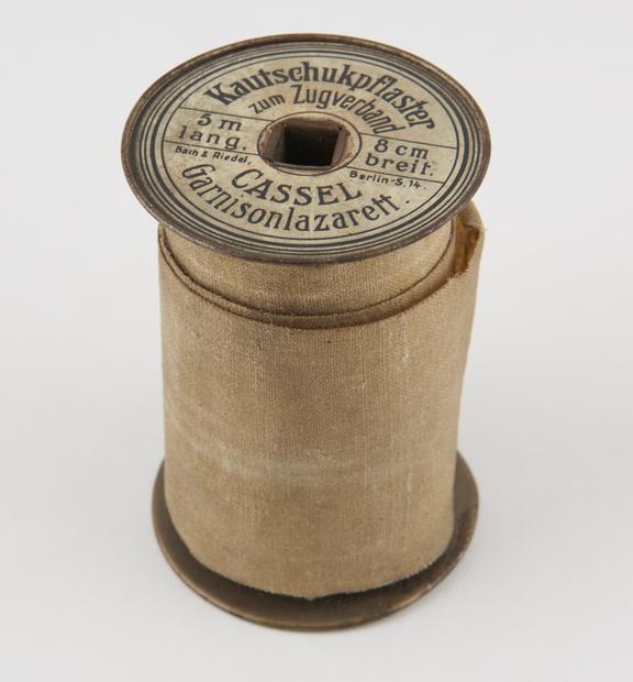 Roll of plaster bandage, in tin dispenser, German