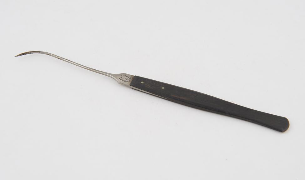 Hernia needle, steel and ebony, by Arnold and Sons of London