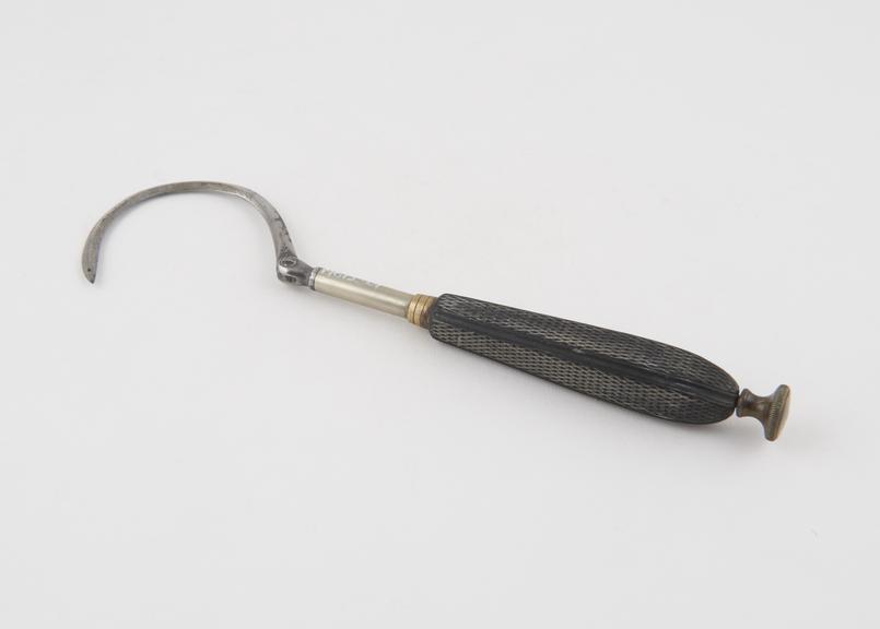 Hernia needle, steel and ebony, hinged blade, by Krohne and Co