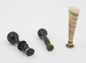 2 wooden seal stamps and 1 shell seal stamp