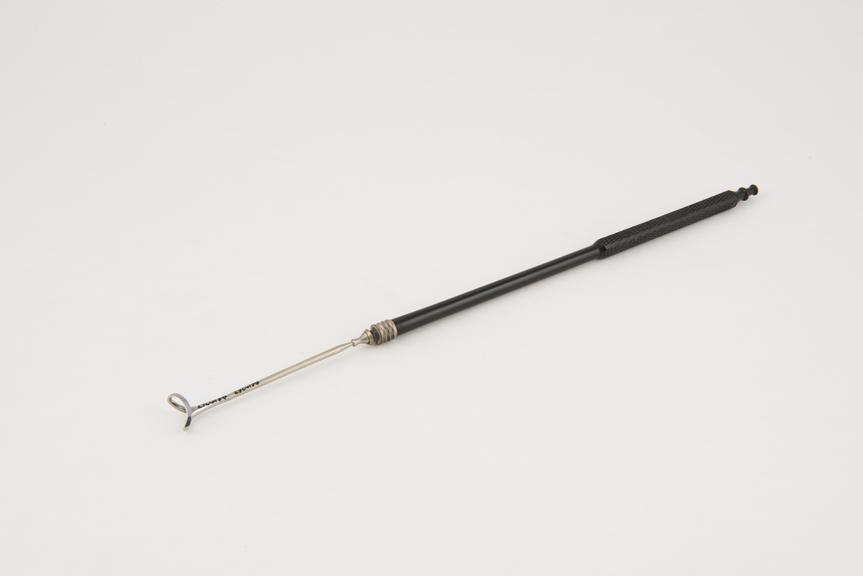 Curette, uterine, steel shaft, ebony handle