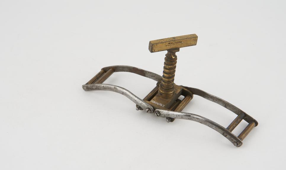 Moffit's winged tourniquet, brass screw clamp only, by Walters