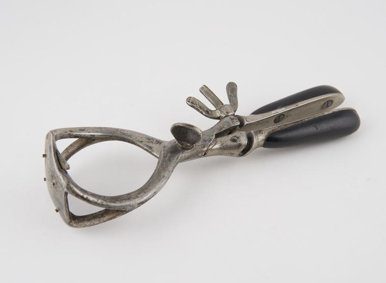 Haemorrhoidal clamp, steel and ebony, by Gardner of Edinburgh