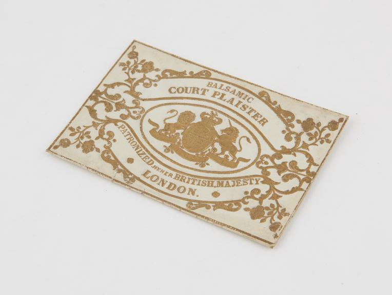 Paper wrapper from a plaster, ornately embossed, 1851-1900