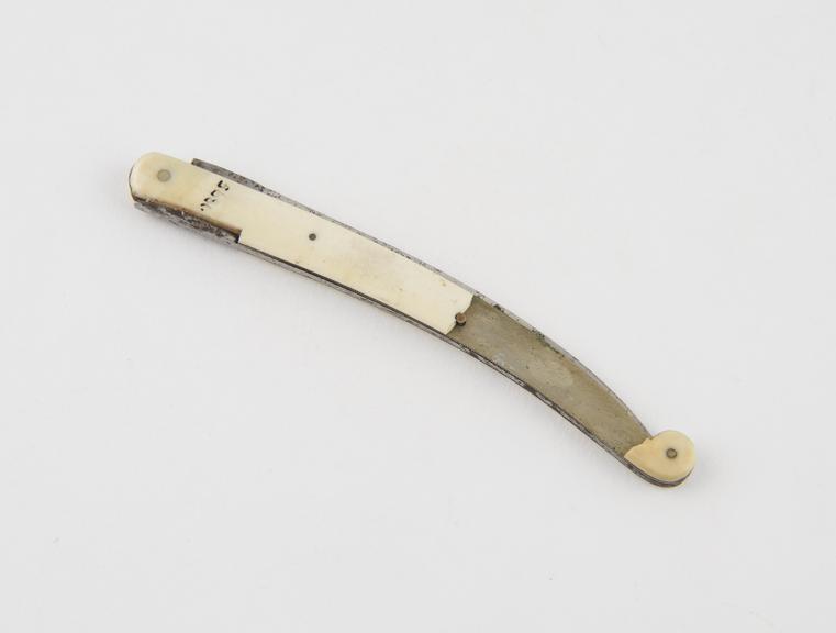 Hernia bistoury, folding, steel, in ivory sheath