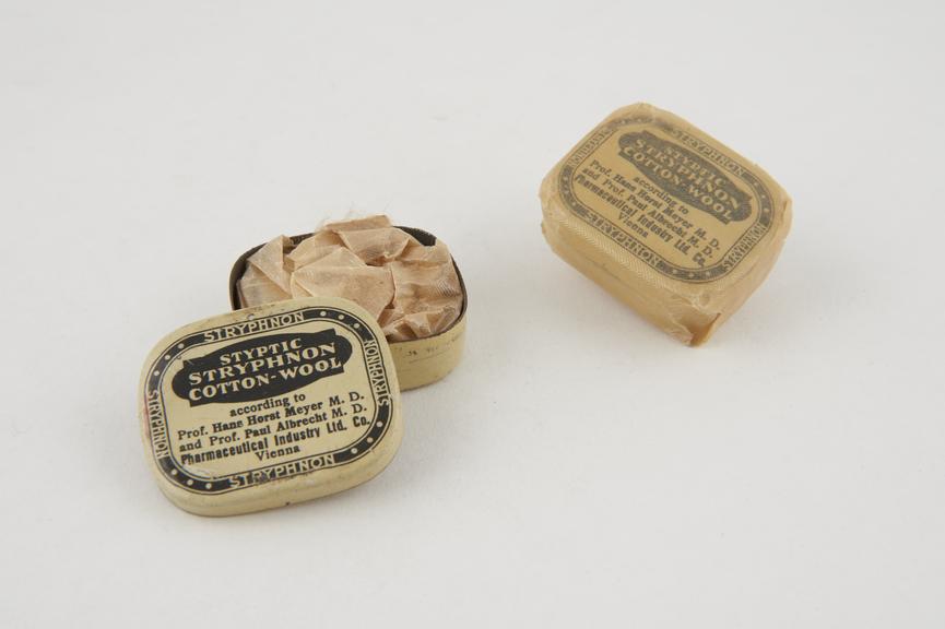 Two tins (one unwrapped) of Stryphnon' styptic cotton wool