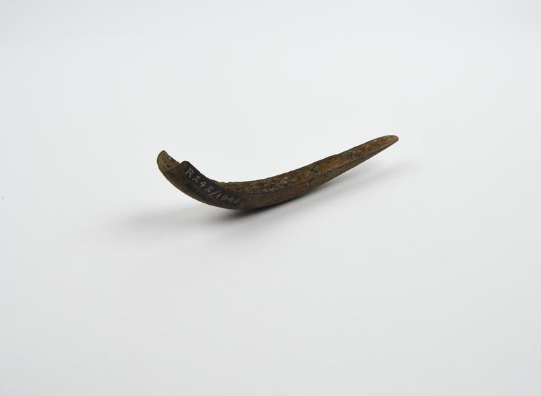 Half curved blade of a bronze strigil, found in London, Roman